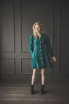 "DETAILS * Short dress with puffed long sleeves * Functional natural coconut buttons * Perfect garment for special events, meetings * Made from soft wash medium weight (185 g) 100 % European linen fabric * Height of the model is 175 cm (5' 9\") and she is wearing size XS dress in dark green color * The full length of linen dress is +/-95 cm/ 37.4\" * Please choose another color and size on the right * Product number: D48 CARE LABEL * machine wash gentle (40 C/104 F) * dry gentle on low heat * wr Green Linen Dress, Wide Leg Linen Trousers, Puffed Long Sleeves, Linen Coat, Dress Buttons, Dark Green Color, Label Machine, Summer Linen, Care Label