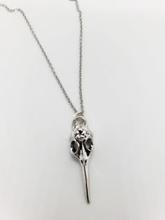 This necklace features a creepy silver bird skull pendant on your choice of stainless steel chain (you choose length) or black cord necklace which is about 17.5" in length plus a 2" extender (19.5" total length). Pendant is silver-plated metal alloy and measures about 1.5" in length. Please message me with any questions or special requests. Thanks for visiting! Silver Adjustable Skull Necklace, Adjustable Silver Skull Necklace, Nickel-free Stainless Steel Skull Necklace, Bird Skull Necklace, Black Cord Necklace, Silver Bird, Bird Skull, Skull Necklace, Skull Pendant