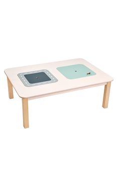 a white table with two different electronic devices on it's top and bottom edge