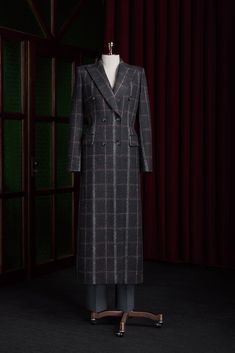 This coats classic black with grey and red plaid is perfect for those who appreciate timeless fashion. This versatile piece adds a touch of sophistication to any outfit. Red Plaid, Classic Black, Timeless Fashion, Plaid, Grey, Red, Black