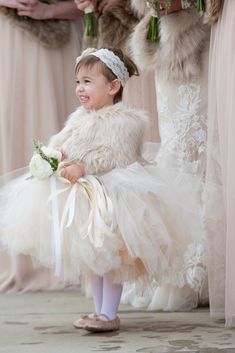 DESCRIPTION High quality faux fur with beautiful lining to keep flower girls warm. Material: Polyester & Satin lining Detail: * Three pairs of hooks for size adjustment;* Comes in 4 sizes* Professional ironed, ready to wear; Small: 25.5 x 7 inches (suggest 1 - 4 years old)Medium: 29.5 x 7.5 inches (suggest 5 - 8 years old)Large: 33.5 x 8 inches (suggest 9 -12 years old)X-Large: 37.5 x 9 inches (suggest 12 -15 years old) Dress With Fur Coat, Winter Flower Girl Dress, Winter Flower Girl, Flower Girl Gown, Girls Winter Dresses, Snow Wedding, Bridesmaid Shawl, Girls Fur, Winter Formal Dresses