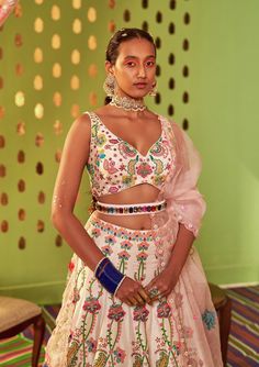 Editor's Note Blush Ivory Floral Embroidery Sleeveless Blouse & Floral Hand Embroidery Sb Signature Enchanted Lehenga With Powder Pink Silk Organza Patch Work Dupatta. Fabric: Dupion, Organza Color: Ivory Care: Dry Clean Only Disclaimer: Product Color May Slightly Vary Due To Photographic Lighting Sources Or Your Monitor Setting. About the Designer Siddhartha Bansal, label epitomise its design philosophy touring around " Golden bird" nation to present day India, in the wanderlust for rich Craft Patch Work Dupatta, Siddhartha Bansal, Floral Hand Embroidery, Golden Bird, Blouse Yoke, Embroidered Lehenga, Design Philosophy, Textile Crafts, Patch Work