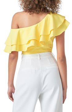 Billowy ruffles grace the one-shoulder neck of a striking crop top. One-shoulder neck Short sleeves Lined 100% polyester Hand wash, dry flat Imported Summer Party Cropped One Shoulder Top, Chic Summer One Shoulder Crop Top, Chic Summer Crop Top With Asymmetrical Neckline, Chic Asymmetrical Neckline Crop Top For Summer, Spring Party One Shoulder Crop Top, Elegant Off-shoulder Top For Summer, Elegant One Shoulder Crop Top For Summer, Spring Ruffled One Shoulder Party Top, Chic One Shoulder Ruffled Sleeveless Top