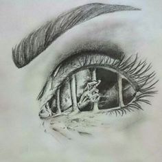 a pencil drawing of an eye with long lashes and the reflection of a building in it