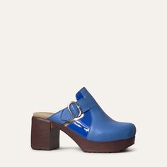 Our Sonja clog in eye-catching cobalt blue leather will elevate any look this season. Featuring an adjustable buckle for a custom fit and a flash of patent leather at the sides, this clog is sure to get you noticed. Set on a wood-like block heel, and chunky platform sole that flexes as you walk, the Sonja clog is both stylish and easy to wear. Heel 7.5 cm / 2.95 in Soft, flexible lightweight sole Leather lined Normal fit Stinky Shoes, Clogs And Mules, Heel Grips, Clog Boots, Clog Shoes, Shoes Too Big, Shoe Tree, Naha, Leather Clogs