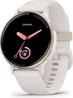 the garmin smart watch is white and has a black face with pink accents on it