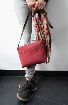 "The Marabara Day bag has been designed to accompany you every day. It is made of cotton canvas in a nice burgundy colour. Don't be tricked by its small size, this bag is roomy enough to carry all your daily essentials (wallet, phone, notebook, sunglasses...) and it's light as a feather. You won't even notice you are carrying it, so comfortable that you will want to take it with you all the time. It closes with a metal zipper and comes with an adjustable leather strap, in chocolate colour. It is Casual Burgundy Shoulder Bag For Everyday Use, Casual Burgundy Shoulder Bag For Everyday, Casual Everyday Burgundy Shoulder Bag, Burgundy Shoulder Bag For Everyday Use, Casual Burgundy Bags For Daily Use, Burgundy Shoulder Bag For Everyday, Casual Red Cotton Shoulder Bag, Red Casual Cotton Shoulder Bag, Casual Burgundy Satchel For Everyday