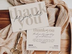 thank you cards and scissors on a table with some yarn in front of them, next to a card that says thank you for your help