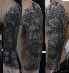 the back of a man's arm with tattoos on it and an image of a demon