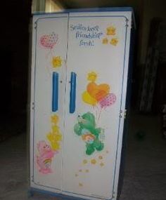 an old fashioned refrigerator with winnie the pooh drawings on it