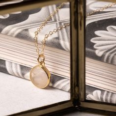 Rose Quartz Small Circle Disc Pendant Necklace - Gorgeous gold and pink jewelry gift for women - Petite, Dainty and elegant necklace for her Stone: Genuine Rose Quartz Pendant: 12mm Diameter Pendant: 3mm thickness Bezel: Vermeil Gold (14k gold over sterling silver) Chain: 14k Gold Filled Chain: 1.3mm Cable Chain Chain: Adjustable from 16 to 18 inches Made in the USA About "Gold Filled Jewelry": Also called rolled-gold. These jewelry items are not actually filled with gold. They are made of a bas Gold And Pink Jewelry, Necklace For Her, Gold And Pink, Rose Quartz Pendant, Small Circle, Elegant Necklace, Pink Jewelry, Disc Pendant, Elegant Necklaces