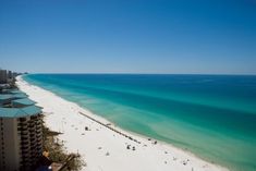 an aerial view of the beach and ocean