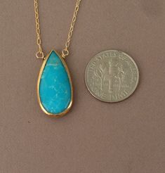 Long Turquoise Stone Bezel Set Gold Necklace Gold Oval Turquoise Gemstone Necklace, Gold Turquoise Pendant Necklace With Cabochon, Gold Teardrop Turquoise Necklace Gift, Gold Turquoise Teardrop Necklace For Gift, Brown Box, Studio City, Gold Filled Chain, Turquoise Stone, Bezel Setting