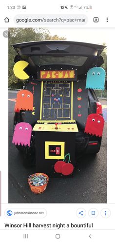 an image of a game in the trunk of a car that is decorated like pacman