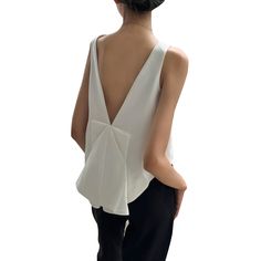 Elegant Sleeveless Vest For Day Out, Elegant Sleeveless Blouse Vest For Day Out, Elegant V-neck Vest For Day Out, Chic Vest Top, Chic Sleeveless Blouse For Day Out, Elegant Vest Top For Spring, Elegant Spring Vest Top, Chic Spring Tank Vest, Chic White Vest