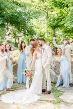 The Barn at Shady Lane Spring Wedding Fun Bridal Party Photos Wedding Party With Tan Suits, Beige Groomsmen Suits Blue Bridesmaid Dresses, June Wedding Bridal Party, Tan Suit Blue Bridesmaid Dress, Sky Blue Bridesmaids And Groomsmen, Blue Bridesmaid Dresses With Tan Groomsmen, Tan Suit Light Blue Tie, Blue Bridesmaids Dresses With Groomsmen, Spring Wedding Colors Bridal Party