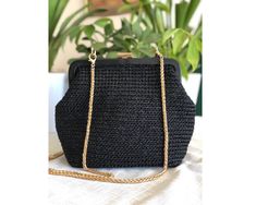 This elegant handcrafted bag is designed to be the perfect accessory for evening attire. The deep black woven texture exudes sophistication, while the sleek gold chain adds a touch of glamour. Ideal for special occasions, this bag is a stylish complement to any woman's night out, enhancing her ensemble with a refined and polished finish. Genuine leather scholarship evening bag Chic Rectangular Evening Bag With Gold Chain, Chic Evening Bag With Gold Chain For Party, Chic Evening Shoulder Bag With Gold Chain, Elegant Evening Bags With Gold Chain, Elegant Party Shoulder Bag With Gold Chain, Rectangular Clutch With Gold Chain For Evening, Chic Evening Bag With Gold Chain, Elegant Evening Bag With Gold Chain, Elegant Evening Bag With Gold Chain For Formal Occasions