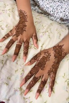 hendi tattoos on someone's hands with the words party henna for her sister