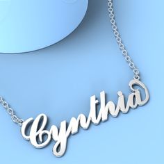 Cynthia name necklace Gold Custom Necklace, Personalized Gifts For Her 
								Add something extra special to your jewelry box with Name Necklace Official engravable necklaces.
								The Cynthia's 14k gold name necklace is best gifts for Cynthia. Name Necklace Official provides affordable engravable jewelry that won't 
								break the bank. In addition, these pieces make for very thoughtful and appreciated gifts for friends and family. 
								And whether valentine's day gifts, mother's day gifts, christmas gifts, wedding gifts, graduation gifts, birthday gifts,
								 NAME NECKLACE are all the best gift choice store. Cynthia Name, Silver Name Necklace, Engravable Jewelry, Name Necklace Silver, Gold Name Necklace, Personalized Gifts For Her, Engraved Jewelry, Gifts Birthday, Engraved Necklace