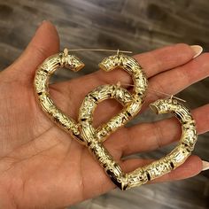 10k Yellow Gold Large Bamboo Heart Earrings 2.5” Inches 9mm Thickness Approximately 13 Grams Comes In A Beautiful Jewelry Box. Eygptain Jewelry, Heart Bamboo Earrings, African Inspired Clothing, Bamboo Earrings, African Inspired, Beautiful Blouses, Cute Earrings, Heart Earrings, Wardrobe Essentials