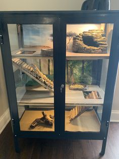 a display case filled with lots of different types of bread and pastries in it