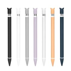 four different colored pens with black, white, and pink ones in them on a white background