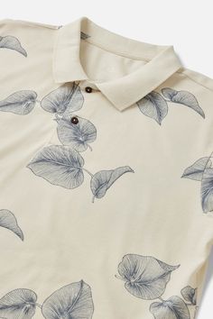 The Gust Shirt showcases a unique tropical leaf design and is made from cotton pique and features a three-button placket with collar. 100% Cotton pique Three-button placket with collar Custom tropical leaf print Ribbed collar and sleeve cuffs Polo Tshirts, Allen Solly, Printed Shirts Men, Tropical Leaf Print, Africa Art, Tropical Leaf, Print Trends, Tshirt Design, Leaf Print