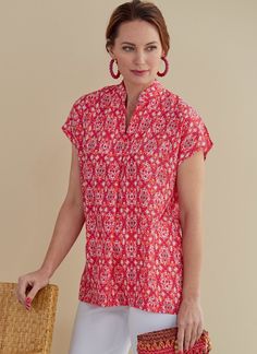 a woman is holding a basket and smiling