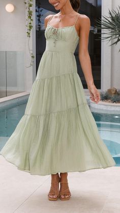 For a flawless finishing touch, we adore complimenting this dress with delicate white or tan heels, a chic cane bag, and elegant gold accents. Movie Core, Dress Sage, Green Beach, Sleeveless Outfit, Fall Winter Dresses, Party Inspo, Spaghetti Strap Maxi Dress, Concert Fits, Backless Maxi Dresses