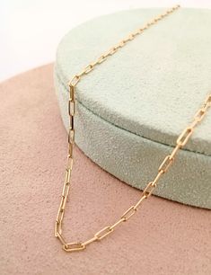 High quality paperclip necklace chain for everyday use. This minimalist design is hand-crafted with love and passion. * Free Express International Shipping NEXT BUSINESS DAY SHIPPING! PRODUCT DETAILS * The product is made of 100% 14k Solid Gold and it has a 14K or 585 stamp on item. (We don't sell filled or plated jewelry) * The package includes a gold certificate. * Every package comes in a gift box. * 14K gold indicates that the product is produced from 58% pure gold. * Chain thickness: 1.50 mm /0,059 inches(front look)  * Chain length: 40, 45, 50 cm/ 16, 18, 20 inches * Chain weight: 2.98 Gram for 20 inches * The product is yellow gold. Follow on Instagram - @pirlant My Web Site - https://www.pirlant.com.tr/ ORDER PROCESS * Available length: 50cm which fits most but if you need longer o Minimalist Paperclip Chain Necklace As Gift, Minimalist Paperclip Chain Necklace For Gift, Minimalist Paperclip Chain Necklace Gift, Minimalist Chain Link Necklace For Gift, Dainty Paperclip Chain Necklace As Gift, Gift Oval Link Paperclip Bracelet With Delicate Chain, Dainty Paperclip Chain Necklace For Gift, Paperclip Necklace With Delicate Chain For Gift, Delicate Chain Paperclip Bracelet As Gift