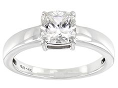 Moissanite Fire(R) 1.30ct diamond equivalent weight cushion cut 14k white gold ring. Measures 3/16" L x 1/16" W. Actual moissanite weight is 1.21ct. Comes with certificate of authenticity. Solitaire Cushion Cut Cubic Zirconia Jewelry, Cushion Cut Solitaire Cubic Zirconia Jewelry, White Solitaire Rings In Cushion Cut, White Square Cut Moissanite Ring, Promise Diamond Ring With Cushion Cut, Promise Cushion Cut Diamond Ring, 14k White Gold Cushion Cut Jewelry, Diamond White Cushion Cut Solitaire Jewelry, Sterling Silver Diamond Ring With Square Cut Center Stone