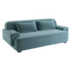 a blue couch sitting on top of a white floor