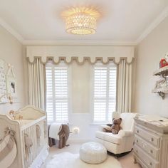 a baby's room is decorated in neutral colors