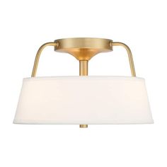 a light fixture with a white shade on it