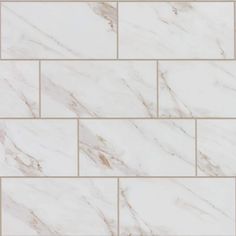 a white marble tile wall that looks like it is made out of tiles