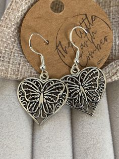 Costume earrings. Boho Butterfly dangling design which is zinc alloy in silver oxidised look and the actual earring hooks are 925 silver which are hypoallergenic. These are a lovely addition to any outfit. 40mm x 21mm  Comes in a drawstring bag. Silver Bohemian Heart Earrings, Bohemian Silver Heart-shaped Earrings, Bohemian Silver Heart Earrings, Oxidized Adjustable Dangle Earrings, Adjustable Oxidized Dangle Earrings, Handmade Bohemian Sterling Silver Heart Earrings, Bohemian Handmade Sterling Silver Heart Earrings, Metal Heart Earrings Gift, Silver Bohemian Heart Earrings For Gift