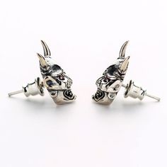 "Skull Earrings, Skull Mask Stud Earrings, Japanese Oni Mask Earrings, Devil Earrings, Sterling Silver Earrings - Made of 925 sterling silver; - Embellished with Red Cubic Zirconia stones; - 925 hallmark on the back; - Earrings size is 0.43\" x 0.59\" (11 mm x 15 mm); - Suitable for men and women alike; - Made by hand." Skull-shaped Metal Earrings With Ear Wire, Metal Skull Earrings With Ear Wire, Skull Shaped Metal Earrings For Gifts, Silver Skull Earrings For Pierced Ears, Adjustable Skull-shaped Earrings With Ear Wire, Silver Skull Earrings With Ear Wire, Adjustable Skull Shaped Earrings With Ear Wire, Silver Skull Earrings, Japanese Oni Mask