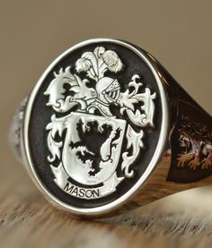 Custom made 925 sterling silver signet ring engravable with any crest, coat of arms, college logo or any other image that you request. Available in different face sizes (S, M, L and XL) (see the product photos). Available in 925 sterling silver, gold plated sterling (vermeil) and rose gold plated sterling (rose gold ve Family Crest Ring, Family Crest Rings, Custom Signet Ring, Family Ring, Family Rings, Arrowhead Necklace, Masonic Ring, College Logo, Silver Signet Ring