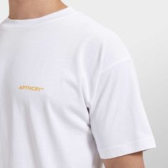 Heavyweight bright white tee. Features a printed sunburst colored micro APTHCRY® logo on the front. Unisex 1" non-topstitched collar Heavyweight fabric 100% cotton Slightly Boxy Fit Single Shirt, Safari Animal Prints, Logo Tee, White Tee, Logo Tees, Logo T Shirt, Low Cut, Tshirt Logo, Bright White