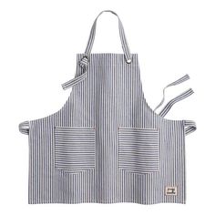 a blue and white striped apron with two pockets on the front, one pocket is open