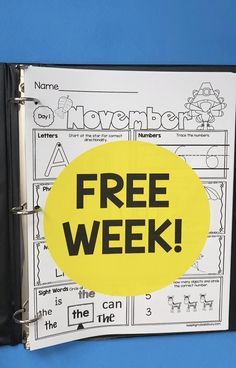 a binder with the words free week written on it and an image of a yellow circle