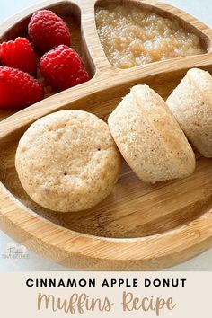 cinnamon apple donut muffins recipe with raspberries in the middle on a wooden plate