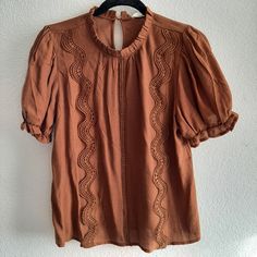 Mod Boutique Rust Orange / Brown Smocked Top For Fall Size M Very Cute Top, Never Worn Only Tried On Once. Fall Smocked Top With Short Sleeves, Short Sleeve Smocked Top For Fall, Brown Smocked Back Top For Spring, Fall Smocked Back Short Sleeve Top, Fall Short Sleeve Smocked Top With Smocked Back, Fall Short Sleeve Blouse With Smocked Back, Fall Blouse With Smocked Back And Short Sleeves, Casual Smock Brown Tops, Casual Brown Smock Tops