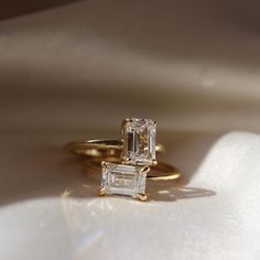 Elevate your Thanksgiving celebrations with our stunning 1.50 Carat East West Emerald Cut Wedding Ring. This exquisite minimalist design features a lab-grown emerald-cut diamond elegantly set in a unique east-west orientation. Symbolizing eternal love, this ring makes a perfect gift for anniversaries or weddings, adding a touch of modern elegance to any occasion. Celebrate love and gratitude with a timeless piece that will be cherished forever. 𝐅𝐞𝐚𝐭𝐮𝐫𝐞𝐬: * 𝐌𝐚𝐝𝐞 𝐭𝐨 𝐎𝐫𝐝𝐞𝐫 * 𝐌𝐞 Minimalist Vvs Clarity Emerald Cut Diamond Ring, Minimalist Moissanite Diamond Cut Rings, Modern 14k Gold Asscher Cut Ring, Modern 14k Gold Asscher Cut Wedding Ring, Modern 14k Gold Radiant Cut Ring, Minimalist Emerald Cut Diamond Promise Ring, Modern 14k Gold Rings With Radiant Cut, Minimalist White Gold Emerald Cut Wedding Ring, Minimalist Asscher Cut Diamond Ring With Brilliant Finish