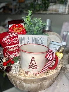 a basket filled with christmas items on top of a table