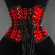 New This Tartan Corset/Waist Cincher Can Be Worn Over Any Blousy Top To Add A Bit Of Scottish Or Irish Flair To Your Renaissance Or Celtic Outfit, Whether A Maiden, Wench, Or Lass. This Corset Has A 3 Hook Front With Gromet Laced Back Tie And An Inner Back Modesty Flap. Spiral Metal Boning In The Side And Metal Busk In The Back And Front. 100% Cotton Outer Shell And Lining Clan Macqueen Modern Tartan Has An Outer Pattern In Red, Black And Gold In A Softer Cotton With An Inner Black Cotton Canvas Red Gothic Fitted Corset Belt, Red Fitted Punk Corset, Red Punk Fitted Corset, Fitted Red Corset For Festival, Celtic Outfit, Outer Pattern, Cincher Corset, Waist Cincher Corset, Corset Waist