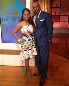 a man and woman standing next to each other in front of a tv screen with the words must haves for spring written on it