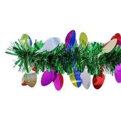 an assortment of christmas ornaments hanging from a tree