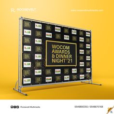 a black and yellow backdrop with the words woom awards and dinner night on it