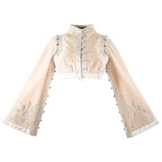 Introducing the archival Alexander McQueen Spring-Summer 2000 ivory silk cropped jacket, a stunning and timeless piece from the late designer's iconic collection. This exquisite jacket features metallic embroidery, adding a touch of opulence and artistry to its design, reflecting McQueen's flair for intricate and luxurious detailing. The cord-wrapped buttons and wide flared sleeves add a touch of drama and elegance, showcasing the designer's mastery in creating statement-making pieces. With its Gucci Runway Outfits, Jacket Runway, Alexander Mcqueen Jacket, White Cropped Jacket, Metallic Embroidery, Metallic Jacket, Evening Jackets, Ivory Silk, Silk Jacket